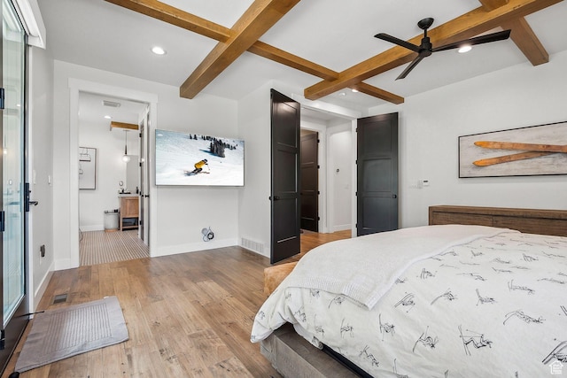bedroom featuring recessed lighting, baseboards, beam ceiling, and wood finished floors