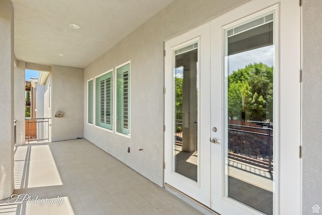 balcony featuring french doors