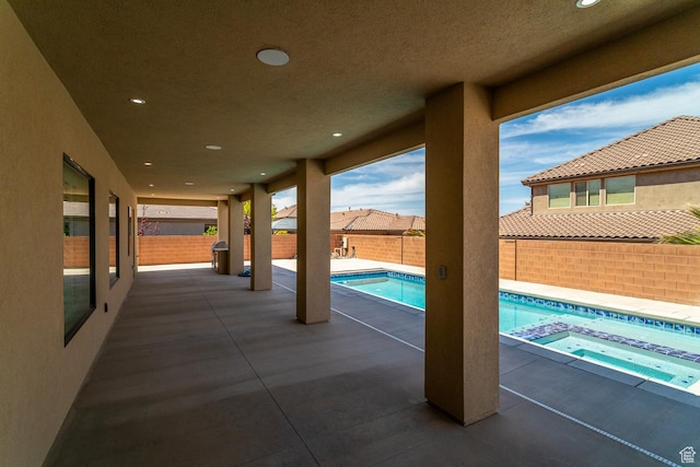 2889 E 1400 S, St George, UT 84790 - view of patio featuring a fenced backyard and a pool with connected hot tub