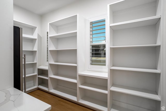 2889 E 1400 S, St George, UT 84790 - walk in closet featuring wood finished floors
