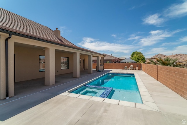 2889 E 1400 S, St George, UT 84790 - view of pool featuring a patio, a fenced backyard, and a pool with connected hot tub