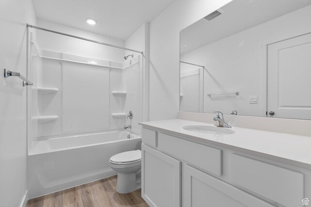 1748 S Windy Ridge Dr Unit 1281, Spanish Fork, UT 84660 - full bath with shower / bathtub combination, vanity, visible vents, toilet, and wood finished floors