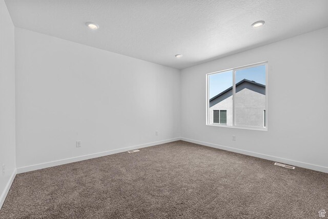 1748 S Windy Ridge Dr Unit 1281, Spanish Fork, UT 84660 - spare room with carpet flooring, visible vents, and baseboards