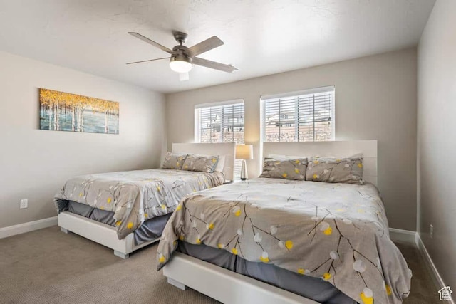 bedroom featuring ceiling fan, baseboards, and carpet flooring