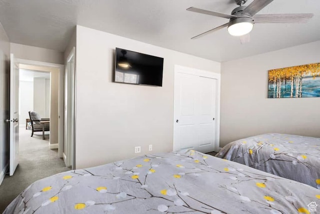 bedroom featuring carpet flooring, a closet, and ceiling fan