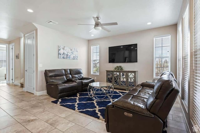 living room featuring recessed lighting, visible vents, baseboards, and a ceiling fan