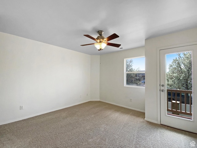 6647 W Merlot Way, West Jordan, UT 84081 - carpeted spare room featuring a ceiling fan and baseboards