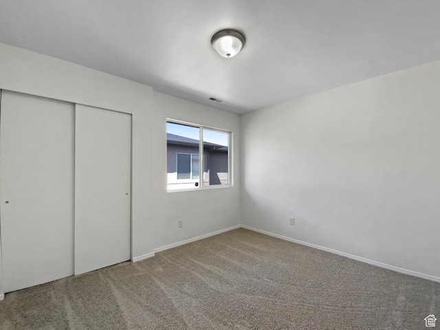 6647 W Merlot Way, West Jordan, UT 84081 - unfurnished bedroom featuring baseboards, carpet floors, visible vents, and a closet
