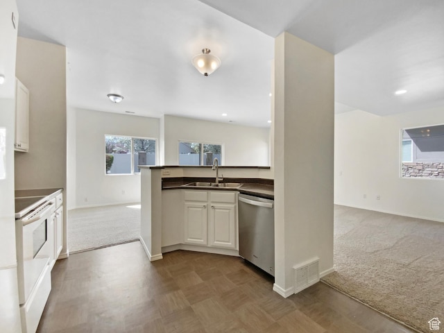 6647 W Merlot Way, West Jordan, UT 84081 - kitchen with dark colored carpet, dishwasher, visible vents, and electric range