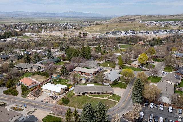bird's eye view with a mountain view and a residential view