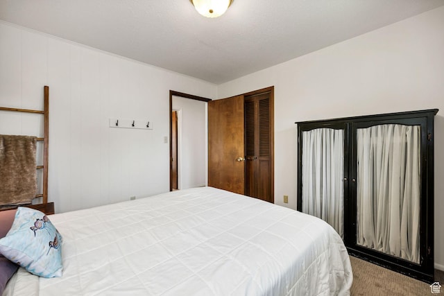 carpeted bedroom with a closet