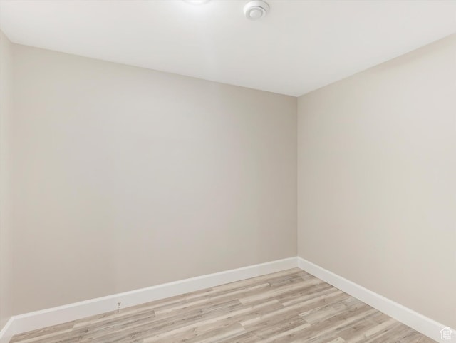 2219 E Fair Winns Ln, Draper, UT 84020 - unfurnished room with baseboards and light wood-type flooring