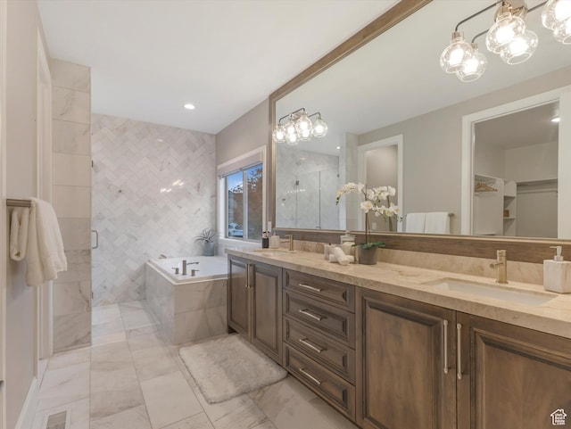 2219 E Fair Winns Ln, Draper, UT 84020 - full bath featuring a sink, double vanity, an inviting chandelier, and a stall shower