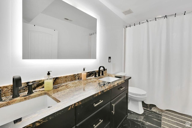 full bath featuring visible vents, marble finish floor, a sink, and toilet