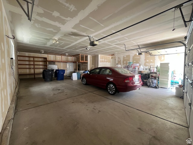 8046 W Harker Canyon Dr, Magna, UT 84044 - garage featuring a garage door opener