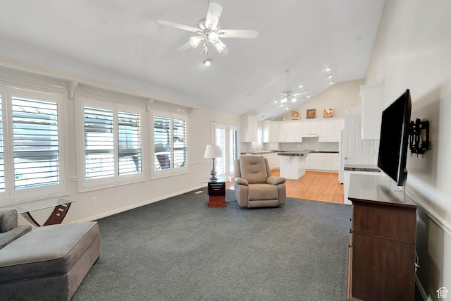 8046 W Harker Canyon Dr, Magna, UT 84044 - living room featuring recessed lighting, a ceiling fan, vaulted ceiling, and light carpet