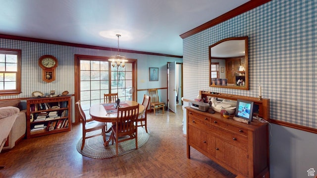 1525 E 200 S, Pleasant Grove, UT 84062 - dining area featuring an inviting chandelier, wallpapered walls, and ornamental molding