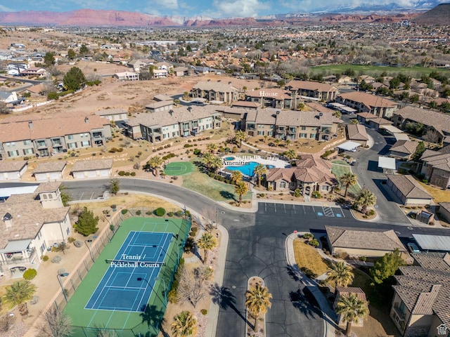 birds eye view of property featuring a mountain view and a residential view