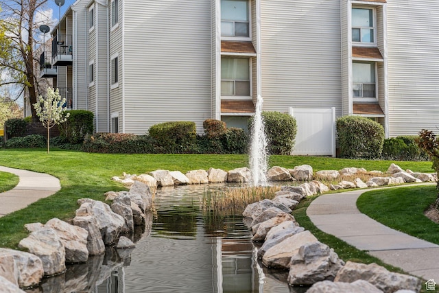 1039 E Quail Vista Ln Unit I, Salt Lake City, UT 84117 - view of community with a yard