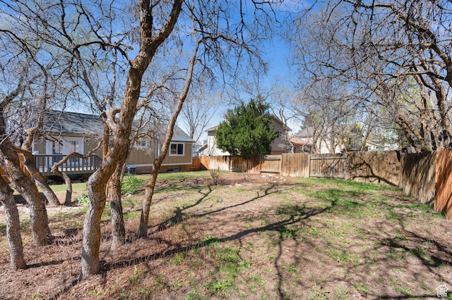 1705 E 2800 N, Layton, UT 84040 - view of yard featuring a fenced backyard and a deck