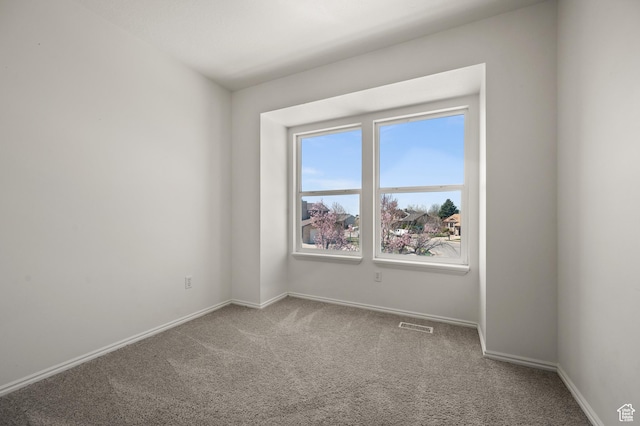 1705 E 2800 N, Layton, UT 84040 - unfurnished room with visible vents, baseboards, and carpet floors