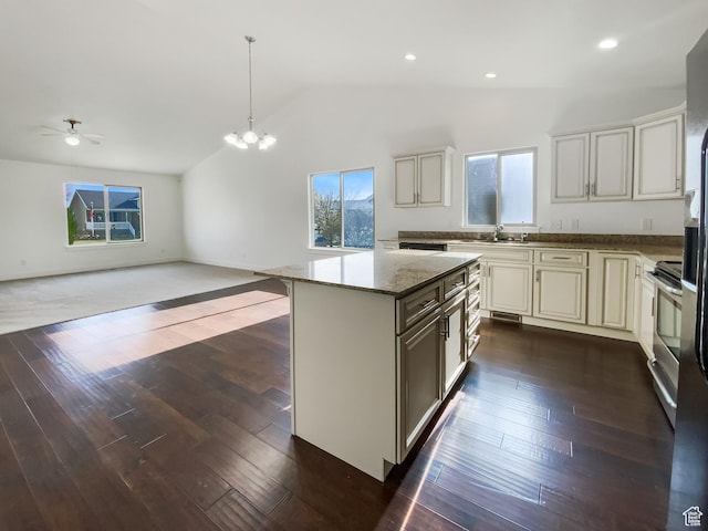 1786 E Juniper Dr, Eagle Mountain, UT 84005 - kitchen featuring open floor plan, electric range, a sink, and vaulted ceiling