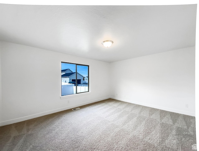 1786 E Juniper Dr, Eagle Mountain, UT 84005 - carpeted empty room with visible vents and baseboards