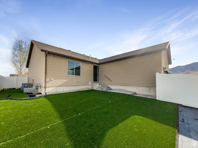 1786 E Juniper Dr, Eagle Mountain, UT 84005 - back of house with a yard and fence