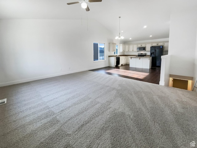 1786 E Juniper Dr, Eagle Mountain, UT 84005 - unfurnished living room featuring recessed lighting, dark colored carpet, visible vents, a ceiling fan, and baseboards
