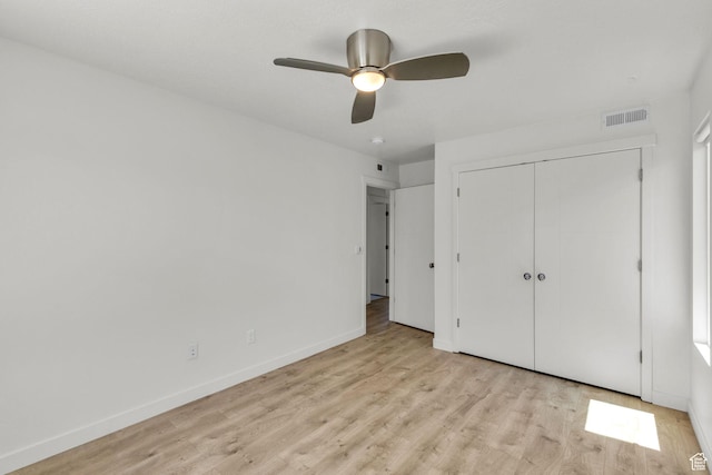 4751 W Vermillion Dr, South Jordan, UT 84009 - unfurnished bedroom with light wood-style floors, baseboards, a closet, and ceiling fan