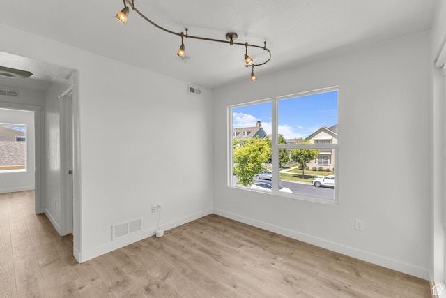 4751 W Vermillion Dr, South Jordan, UT 84009 - unfurnished room with light wood finished floors and baseboards
