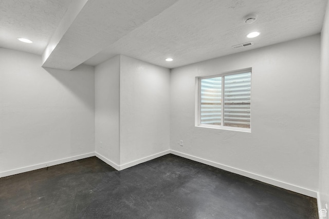 4751 W Vermillion Dr, South Jordan, UT 84009 - below grade area with a textured ceiling, baseboards, and recessed lighting