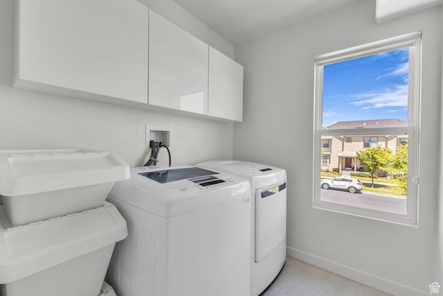 4751 W Vermillion Dr, South Jordan, UT 84009 - laundry area with cabinet space, independent washer and dryer, and baseboards