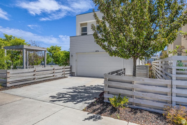 4751 W Vermillion Dr, South Jordan, UT 84009 - view of side of home with driveway and a garage