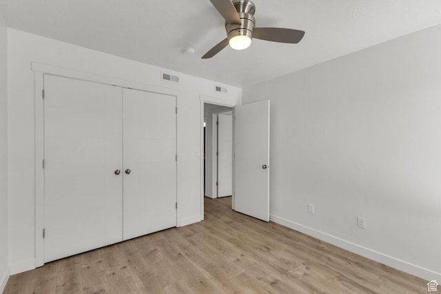 4751 W Vermillion Dr, South Jordan, UT 84009 - unfurnished bedroom with baseboards, light wood finished floors, a closet, and a ceiling fan