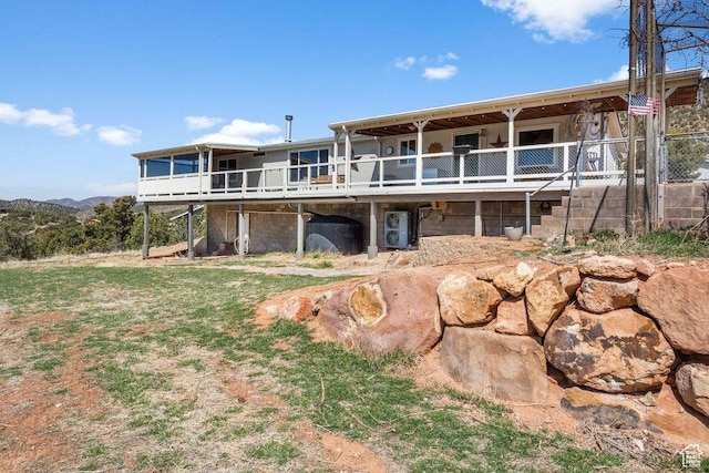 706 E Cottontail Rd, Central, UT 84722 - rear view of house featuring a deck