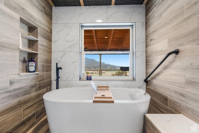 706 E Cottontail Rd, Central, UT 84722 - full bath featuring tile walls and a soaking tub