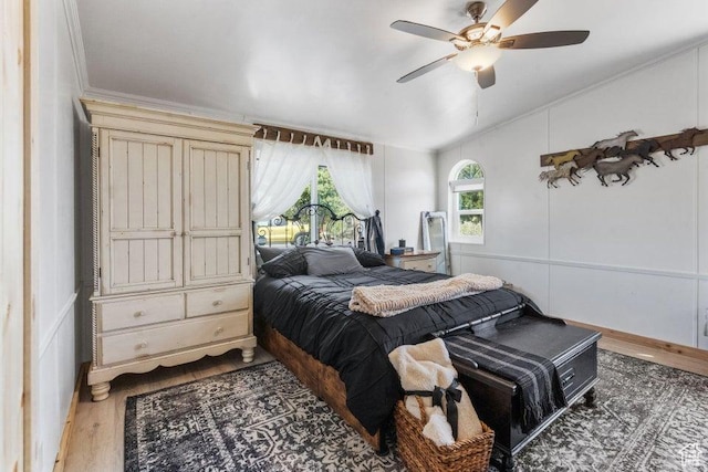 706 E Cottontail Rd, Central, UT 84722 - bedroom with a decorative wall, ornamental molding, and wood finished floors