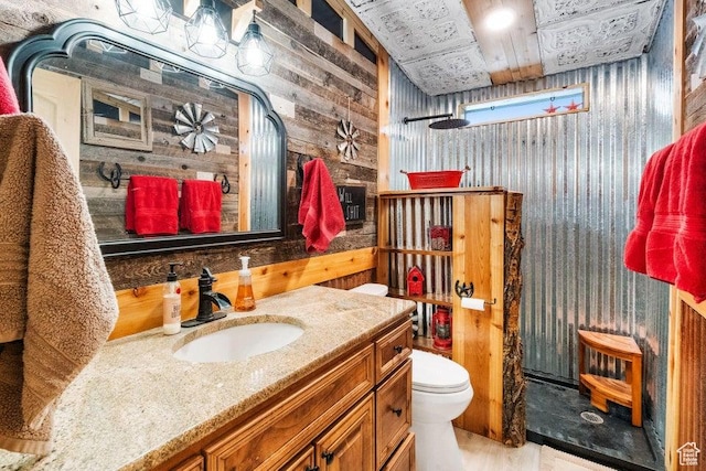 706 E Cottontail Rd, Central, UT 84722 - full bathroom featuring toilet, wood walls, vanity, and walk in shower