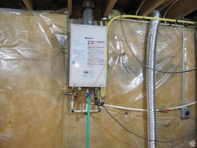 45 River Circle Dr, Logan, UT 84321 - utility room featuring tankless water heater