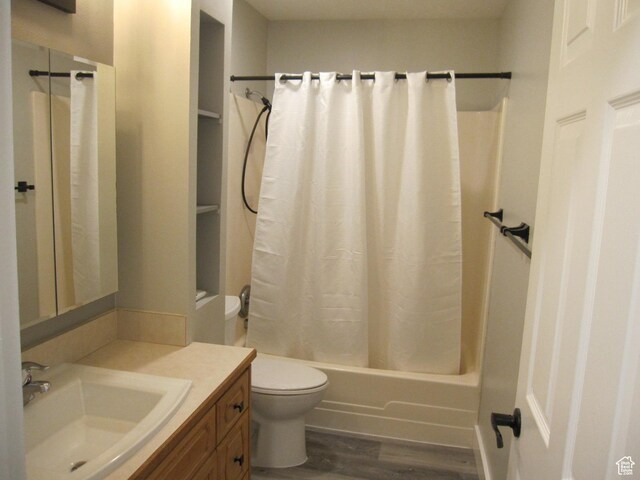 45 River Circle Dr, Logan, UT 84321 - full bath with toilet, wood finished floors, shower / bath combo with shower curtain, and vanity