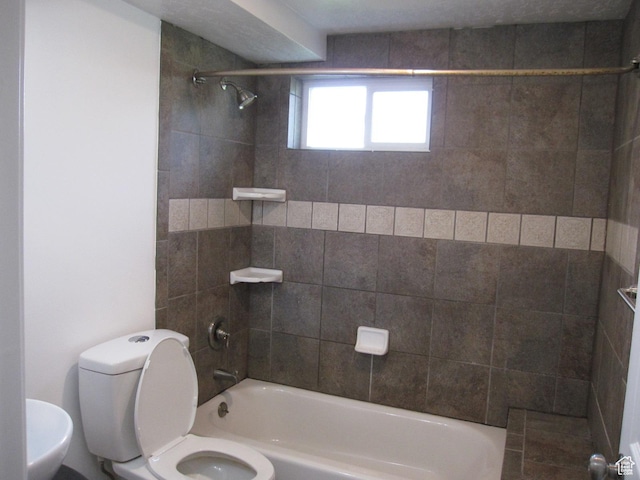 45 River Circle Dr, Logan, UT 84321 - bathroom featuring shower / bathing tub combination and toilet