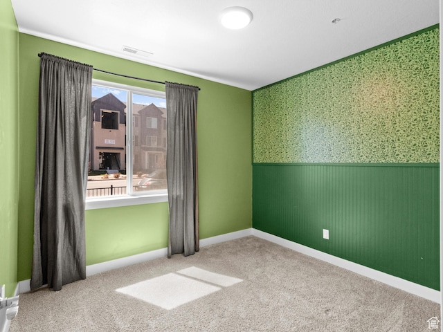 3679 W 1530 N Unit 102, Lehi, UT 84043 - carpeted spare room with baseboards, wainscoting, visible vents, and wallpapered walls