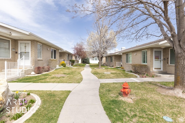 1454 W Cornerstone Dr, South Jordan, UT 84095 - view of property's community with a residential view and a lawn