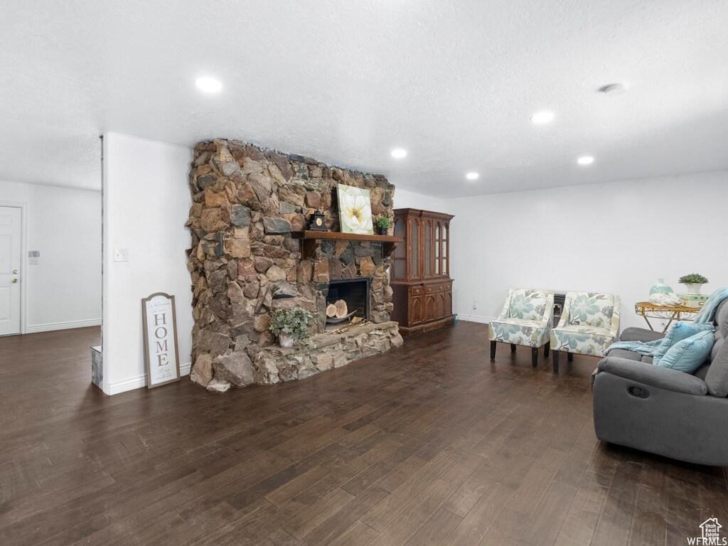 3168 W N Pln, City Road, Plain City, UT 84404 - living area featuring recessed lighting, wood finished floors, a fireplace, and baseboards
