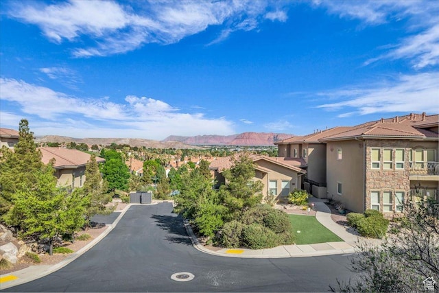 view of street featuring a residential view and a mountain view