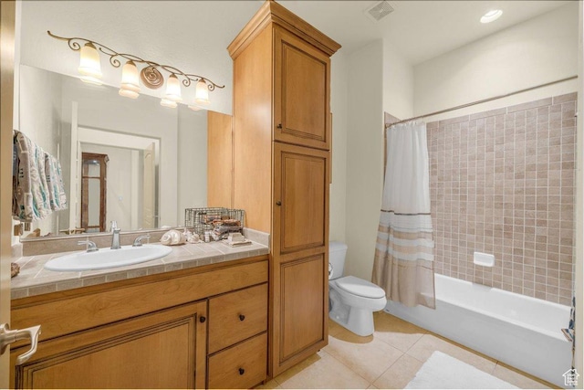 full bath featuring vanity, shower / bath combo, tile patterned flooring, toilet, and visible vents