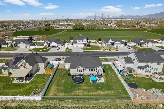 aerial view featuring a mountain view and a residential view