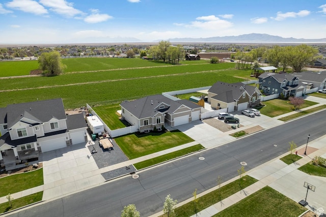 drone / aerial view with a mountain view and a residential view