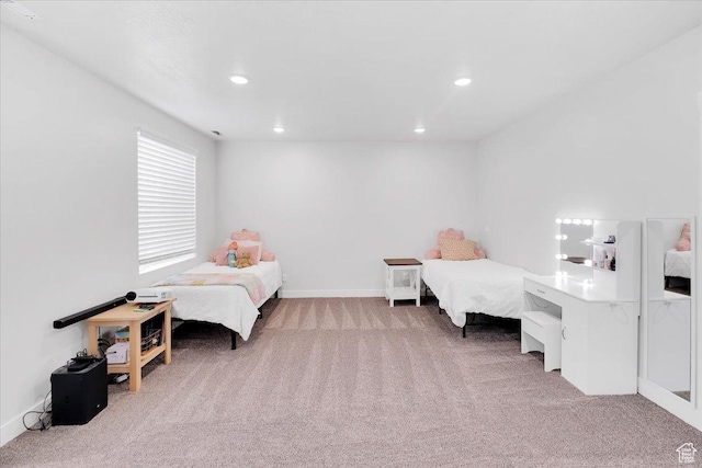 bedroom featuring recessed lighting, baseboards, and carpet floors